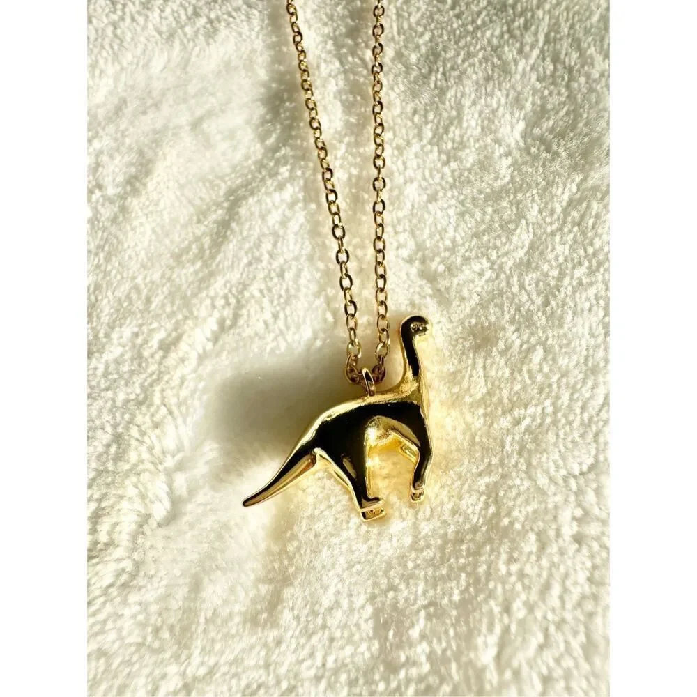 Gold color brachiosaurus pendant necklace